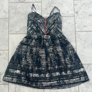 Roxy navy and White Mini Dress with pink accents. Medium but runs a bit small.
